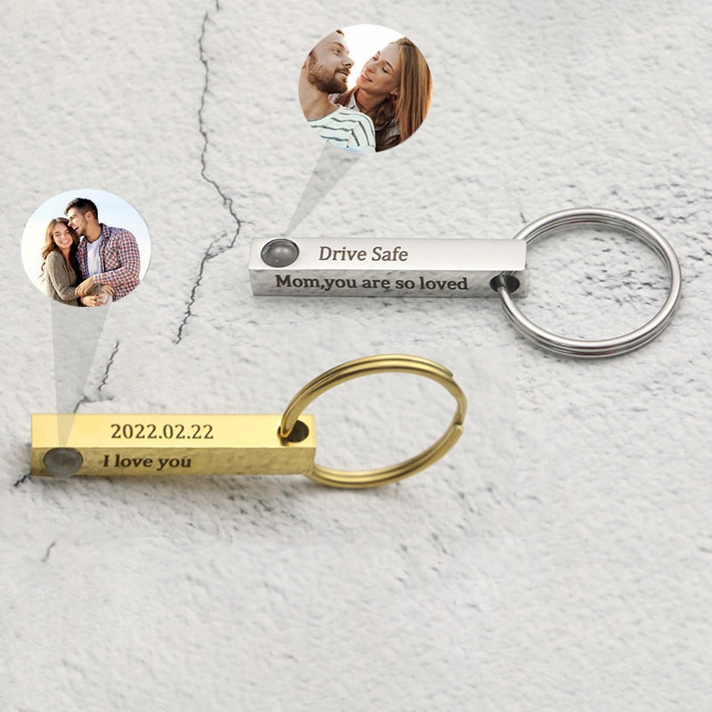 Silver and gold engraved photo bar keychains with Drive Safe and I love you, couple photos shown
