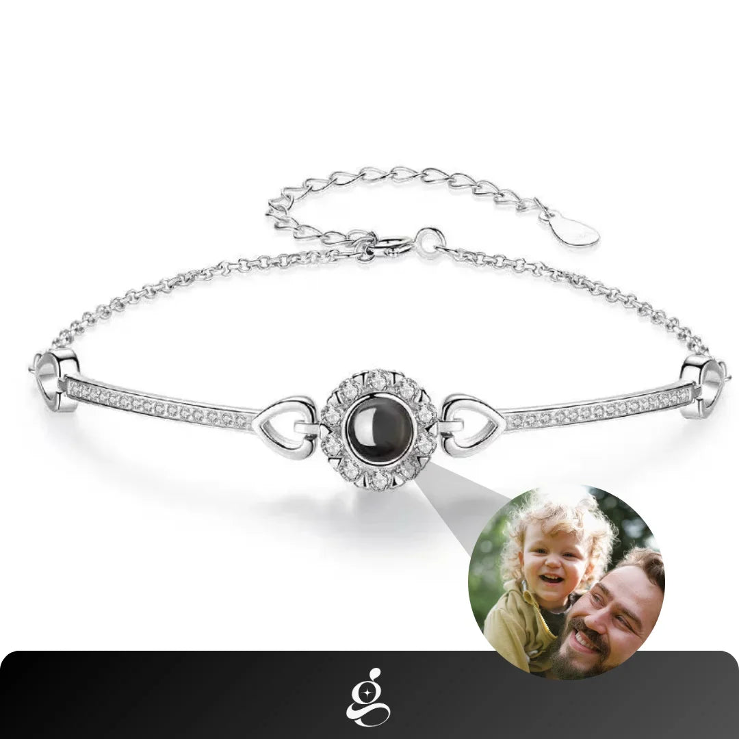 Silver photo projection bracelet with crystal halo and heart links, father and child photo shown, GemShop logo