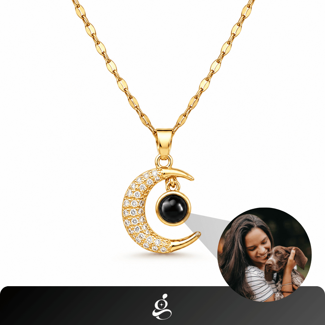 Gold crescent moon photo necklace with crystal pave, revealing a woman hugging her dog, GemShop logo